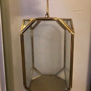 2 gold glass lanterns